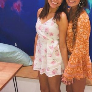 White and pink romper